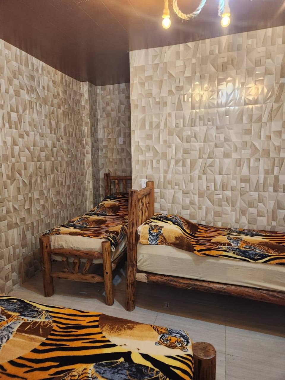 Quarto múltiplas camas